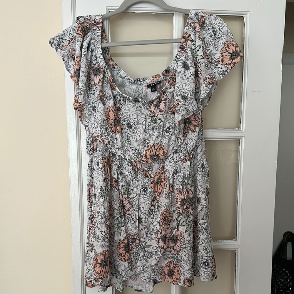 Torrid Ruffled Smocked Flutter Sleeve Top in black, light pink and peach floral